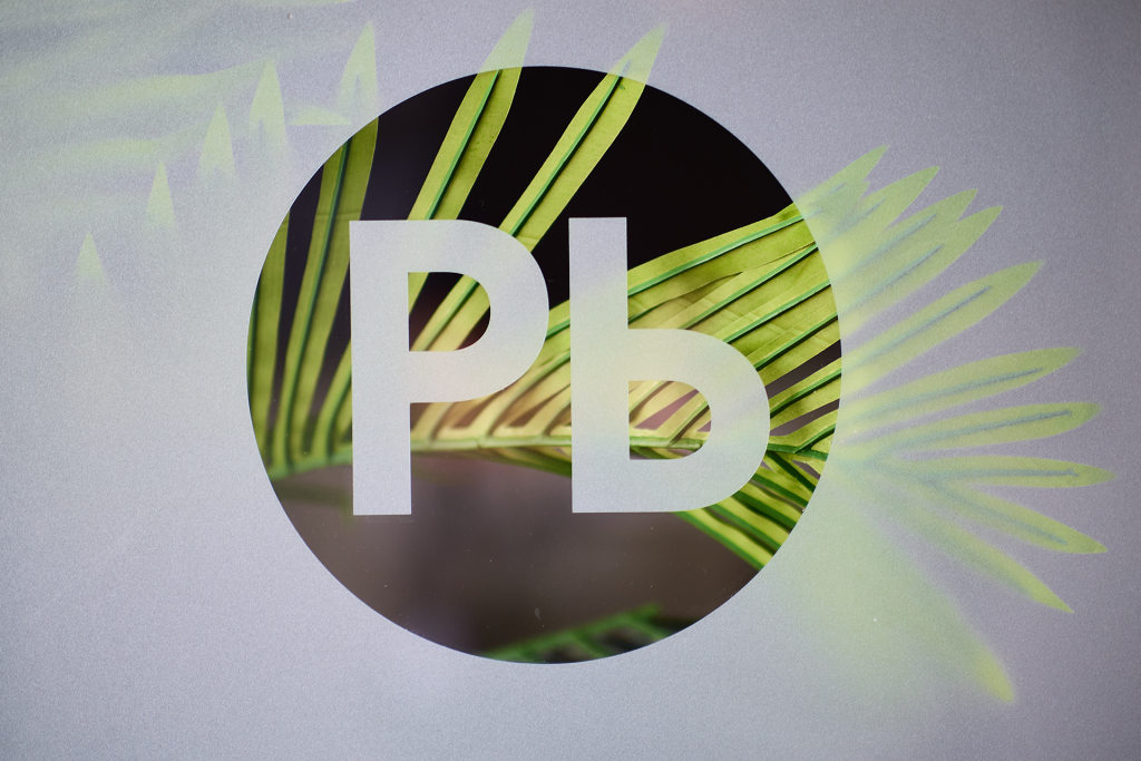 pb logo through frosted glass